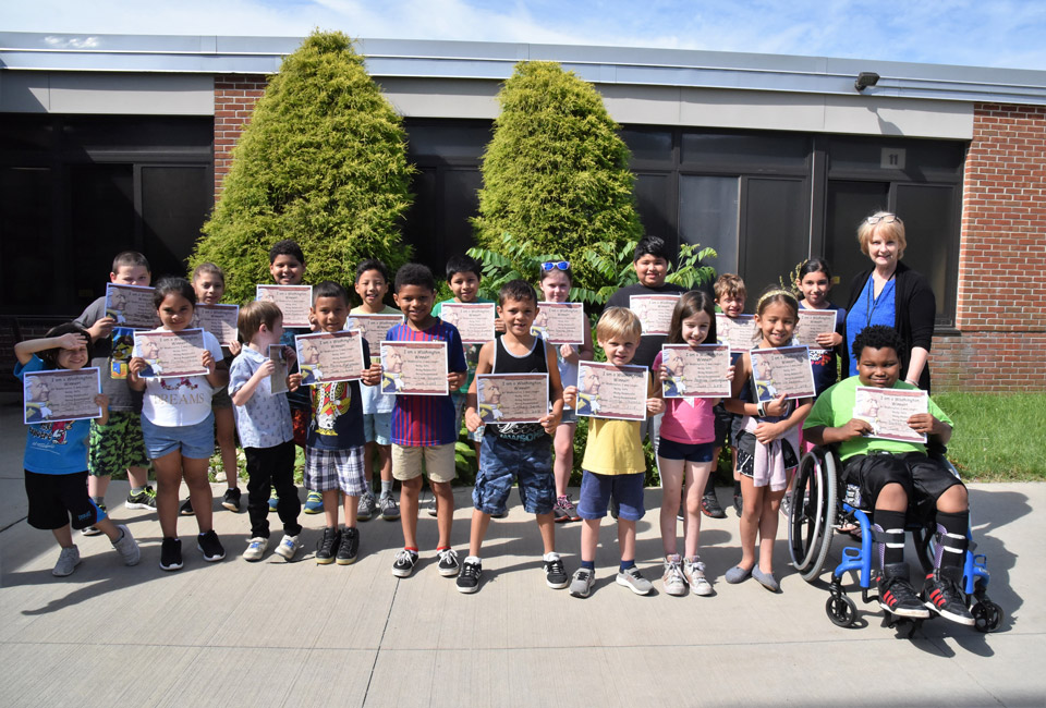 Principal Marsha Neville with June's Washington Ways Award recipients 