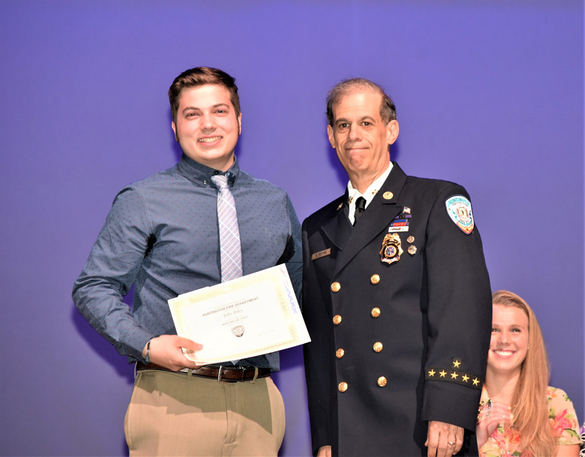 Howard Munson Scholarship Award recipient John Riley with HFD ex-Chief Neil Getter 