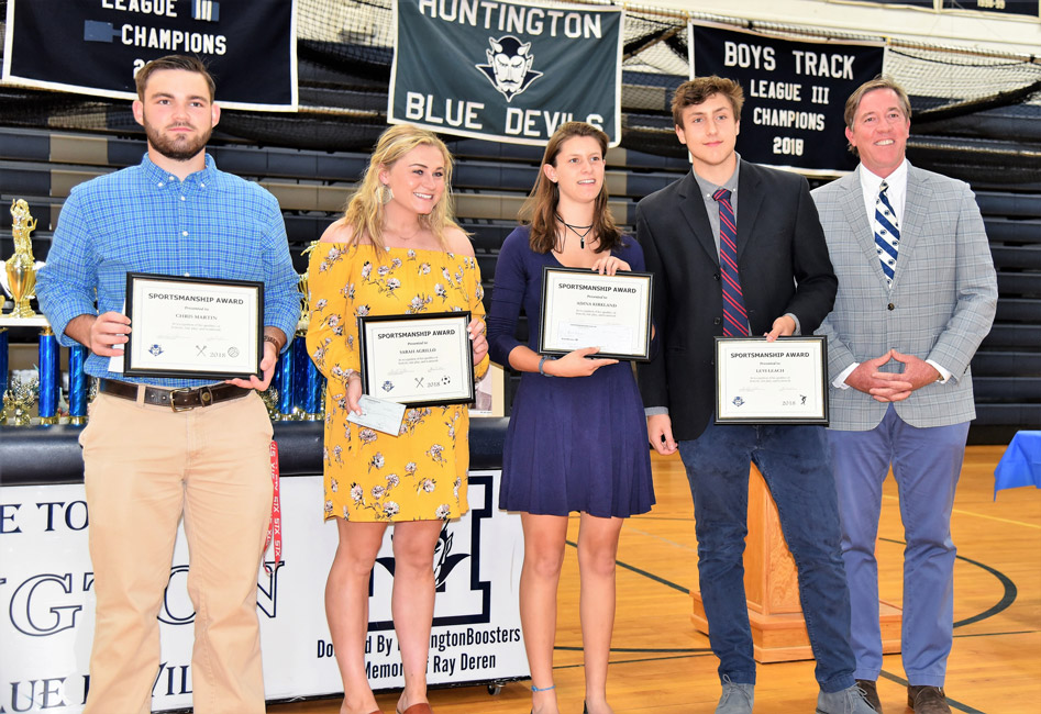 Booster Club President Tim Pillion with Chris Martin, Sarah Agrillo, Adina Kirkland and Levi Leach
