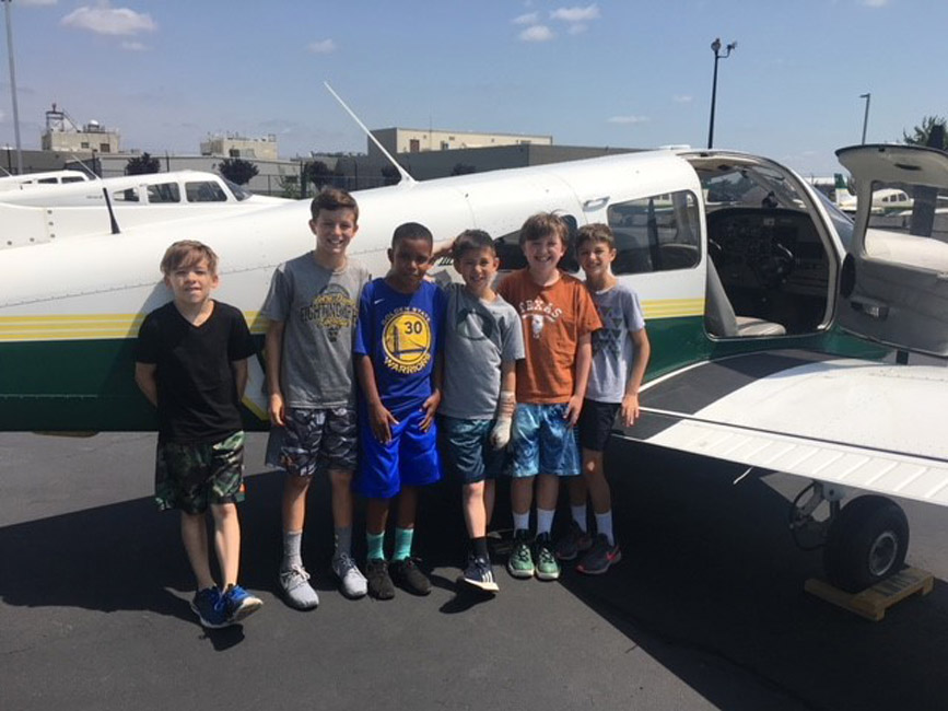 Huntington STEM Summer Academy participants at Farmingdale State College's Aviation Flight Center