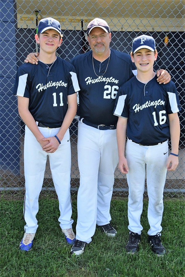Coach Paul Caleca with Finley baseball captains Kevin Drake and Dylan Schnitzer
