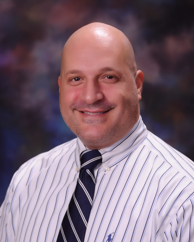 Huntington JV boys' lacrosse team head coach Anthony Troffa.