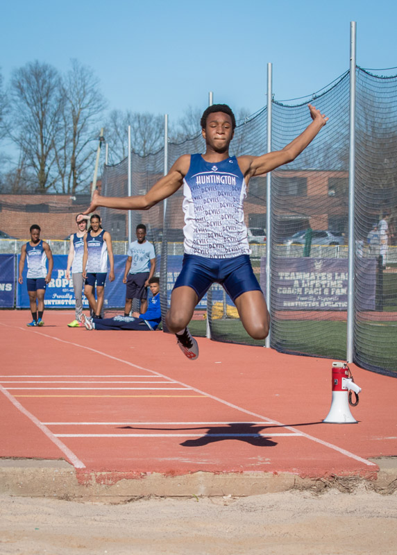 Anthony Joseph soars in long jump. (Mike Connell photo.)