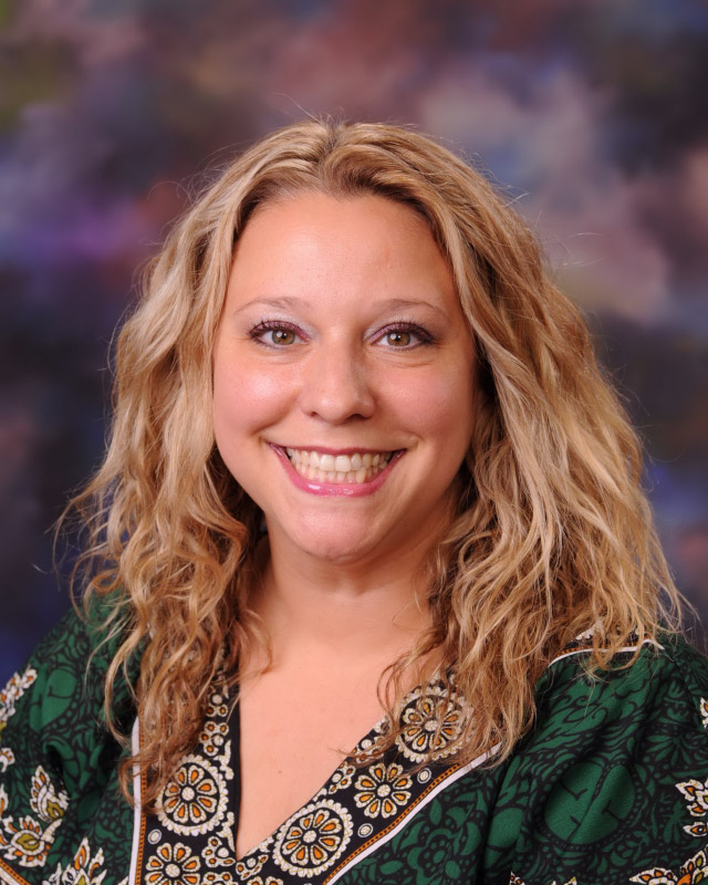 Huntington social studies teacher Camille Tedeschi is the Interact club's faculty advisor.