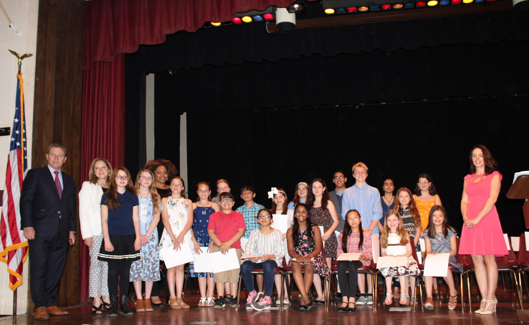 Woodhull's four honorees joined their counterparts from across the town for a celebratory photo with town officials.