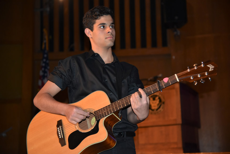 Huntington sophomore Chris Bavaro performing at the recent high school spring concert 