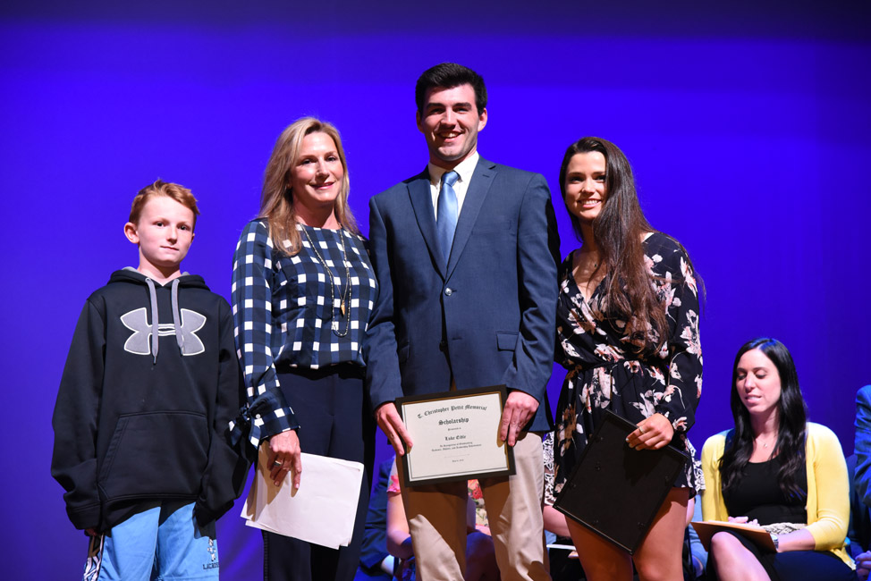 Amber Stieve and Luke Eidle with members of Chris Pettit's family 