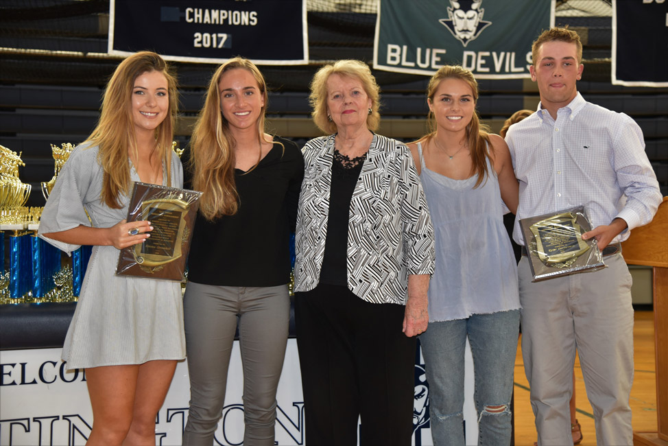 Emma Greenhill (left) and Tyler Gerbavsits (right) with members of Ray Deren's family