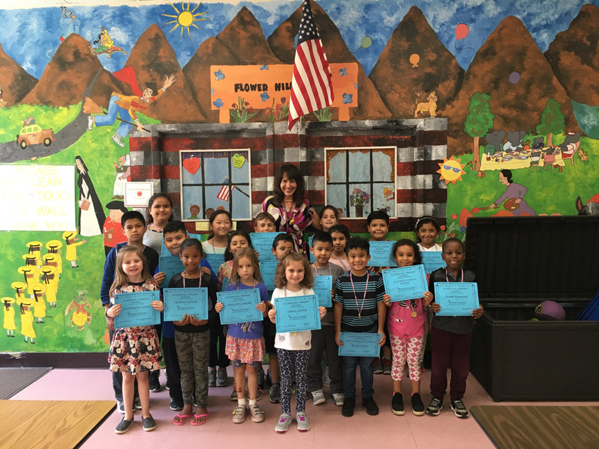 Flower Hill's Star Student Award recipients for May with Principal Lucia Laguarda.