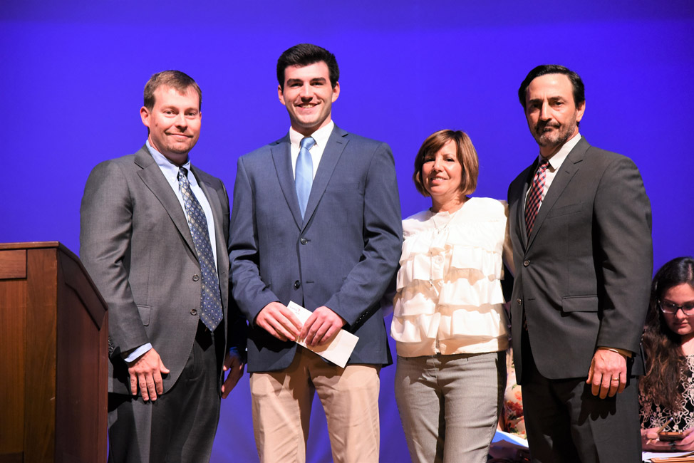 Justin Giani scholarship recipient Luke Eidle with James Graber and Linda and Joseph Giani 