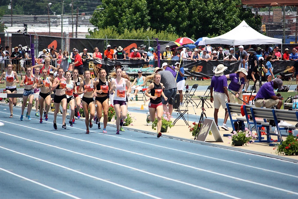 Nicole Abbondandelo (in first place) leads the 2000m steeplechase pack at the nationals. 