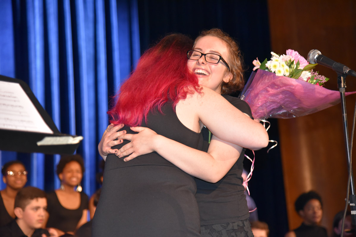 Choir members presented director Victoria Garbarino with a bouquet of flowers