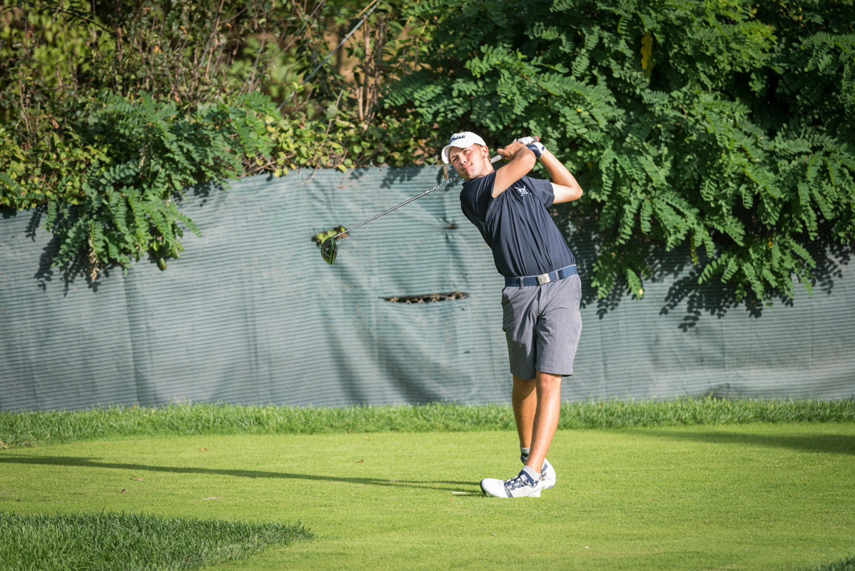 Huntington golf star Tyler Gerbavsits lets it rip off the tee. (Darin Reed photo.)
