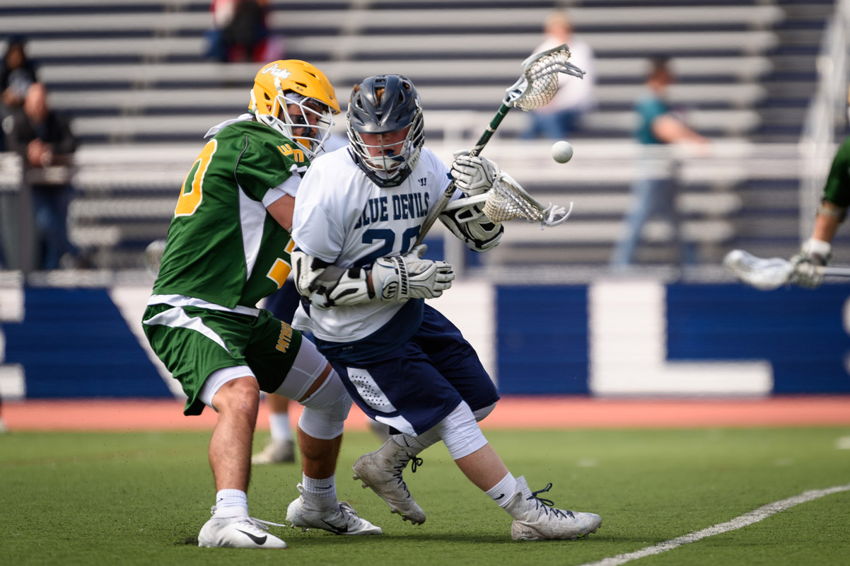 Colby Martin in action for Huntington lacrosse. (Darin Reed photo