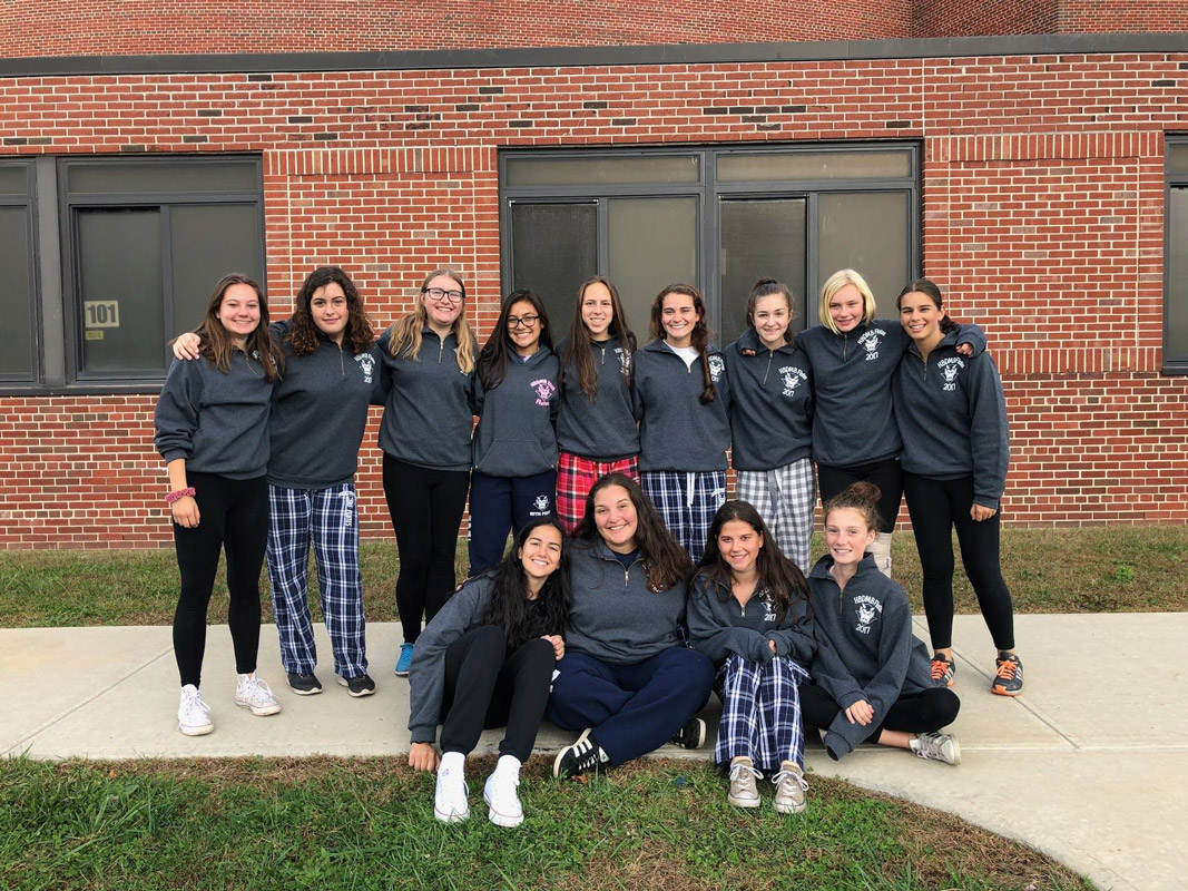 Alyssa Befumo (second from left in front) with the Blue Devil marching band's flute section.