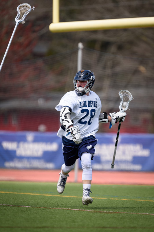 Colby Martin in action for Huntington lacrosse. (Darin Reed photo