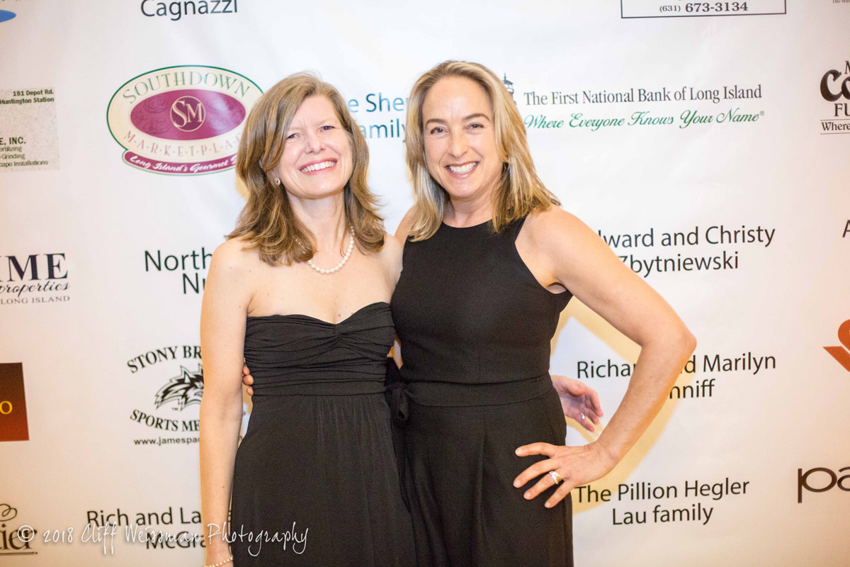 Emily Rogan (right) with fellow trustee Jennifer Hebert at this year's Huntington Foundation gala at OHEKA Castle.