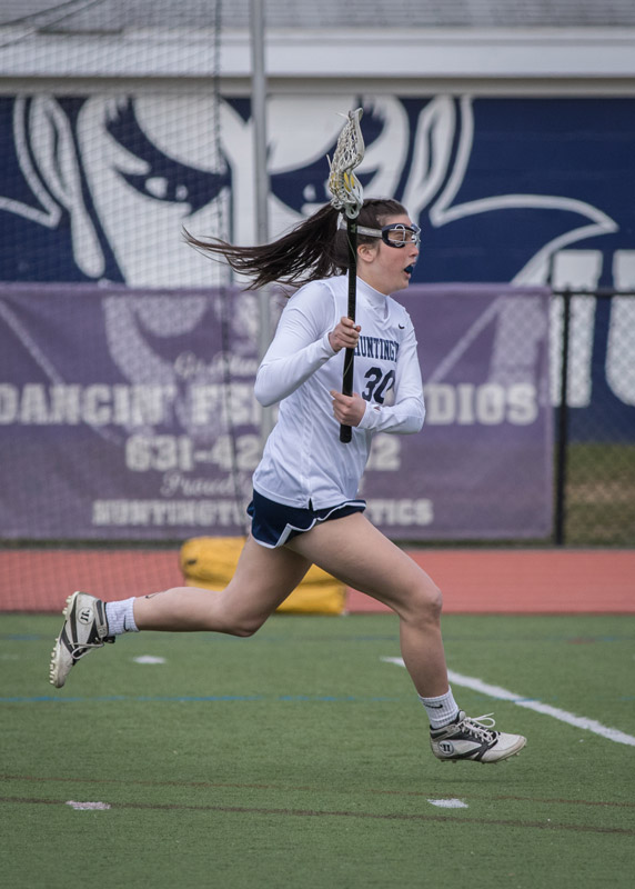 Senior Catie Ricciardelli with the ball for Huntington. (Mike Connell photo)