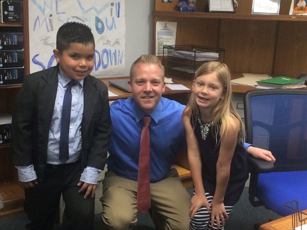 Southdown Principal Scott Oshrin with Ethan Meza and Calder Lyon.
