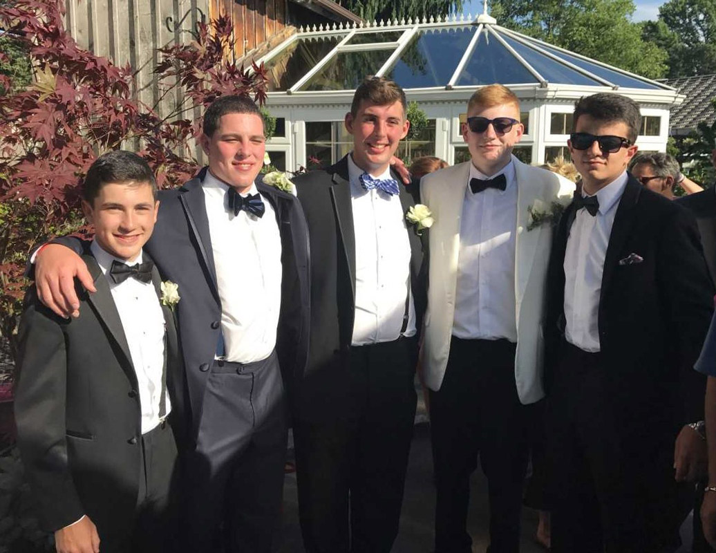 Rocco Meagher (center) with his friends at last June's Huntington prom.