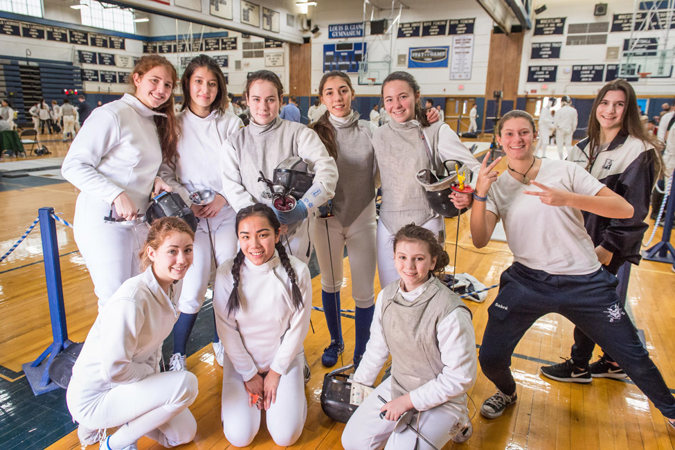 The Blue Devil girls' fencing team is closeknit group of athletes. (Darin Reed photo.)