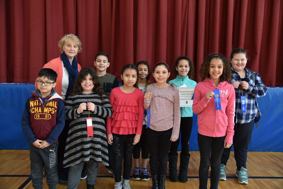 Principal Marsha Neville with Washington School Science Fair Award recipients.