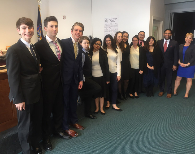 The Huntington mock trial team prior to last week's Sweet 16 round match.