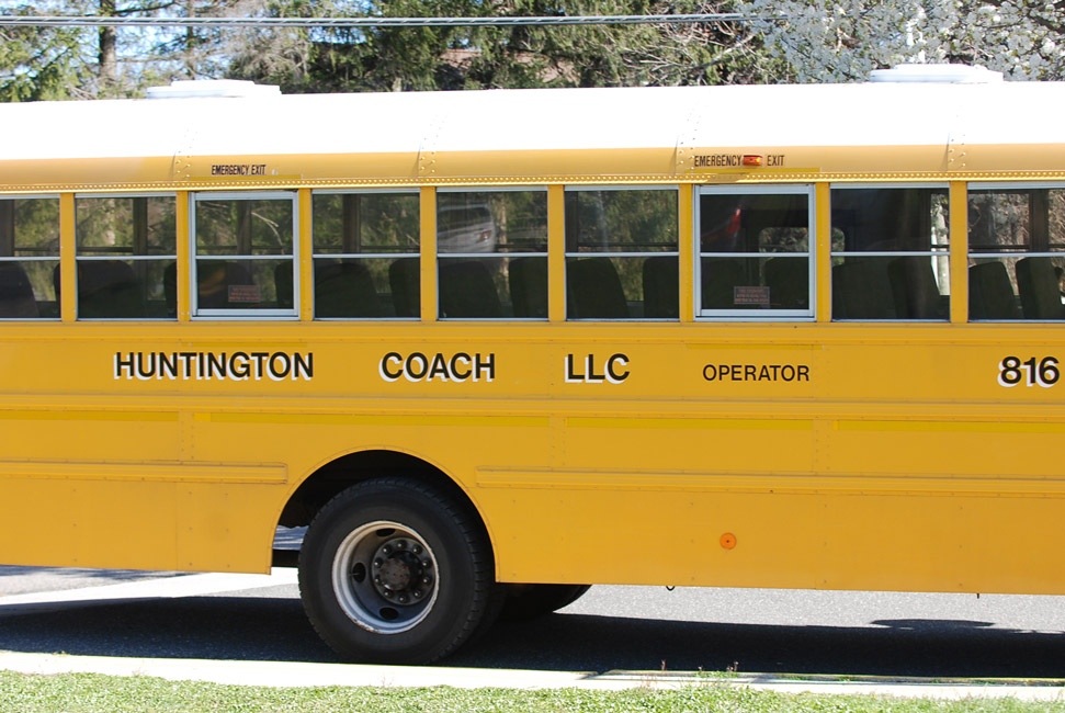 Huntington students stuffed a large school bus three times with food and donated the items to local pantries.