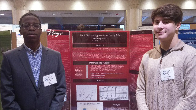 Terrel Cox and Samuel Roberts at the Crest Hollow with their project.