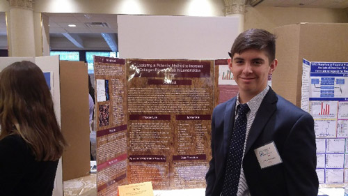 Matt Gennarelli with his science research project at Crest Hollow.