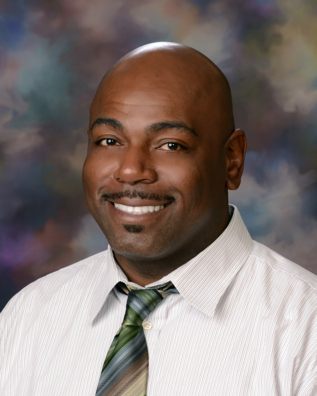 Huntington boys' track and field head coach Ronald Wilson.