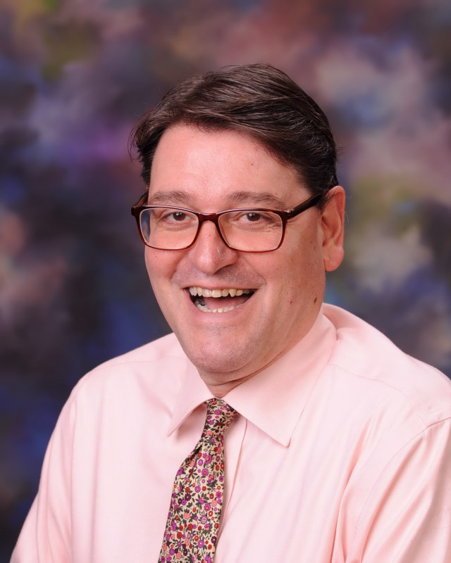 English teacher Mike Schwendemann is the high school drama club's longtime faculty advisor.