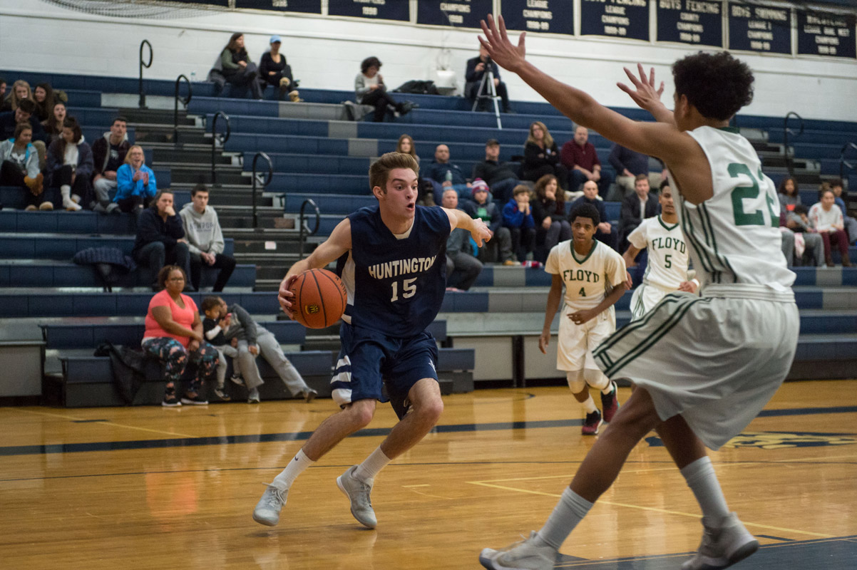 Huntington senior Nat Amato puts a move on the defense. (Darin Reed photo.)
