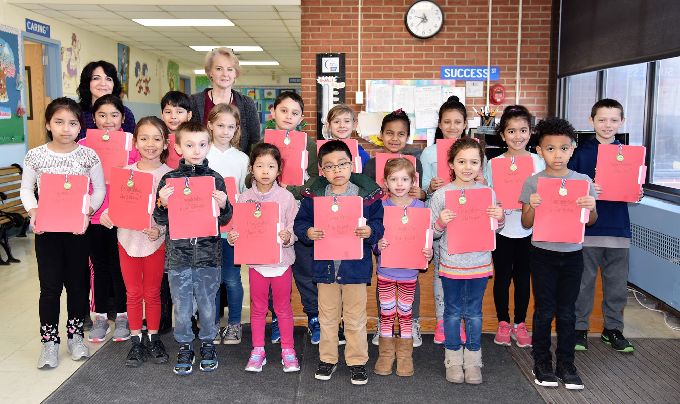 March's Featured Artists with art teacher Maria Mazzola and Washington Principal Marsha Neville.