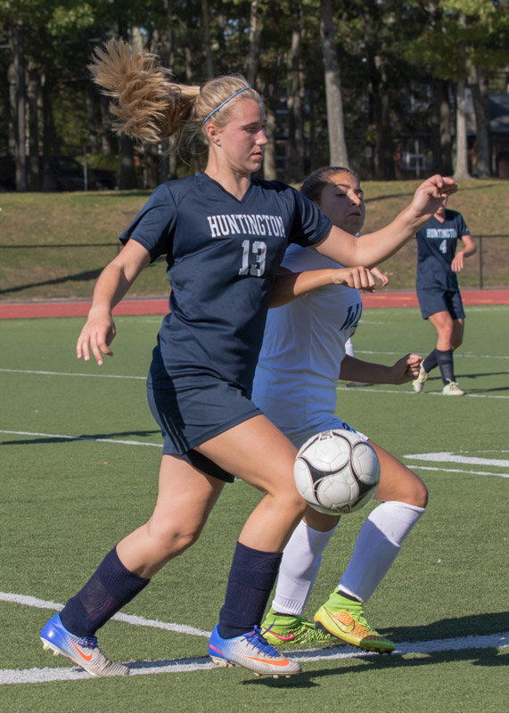 Katie Seccafico (left) battles for the ball. (Mike Connell photo.)