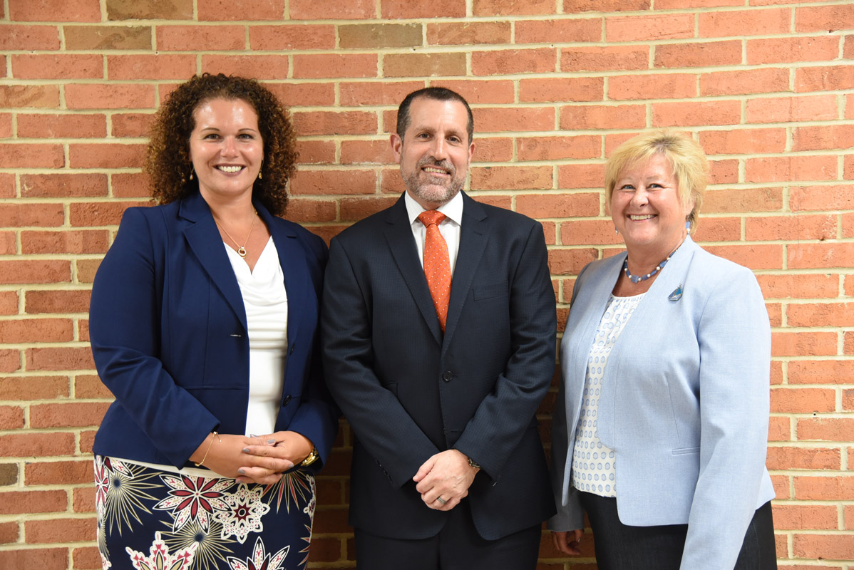 Superintendent James W. Polansky is flanked by Assistant Superintendents Beth McCoy and Kathleeen Acker