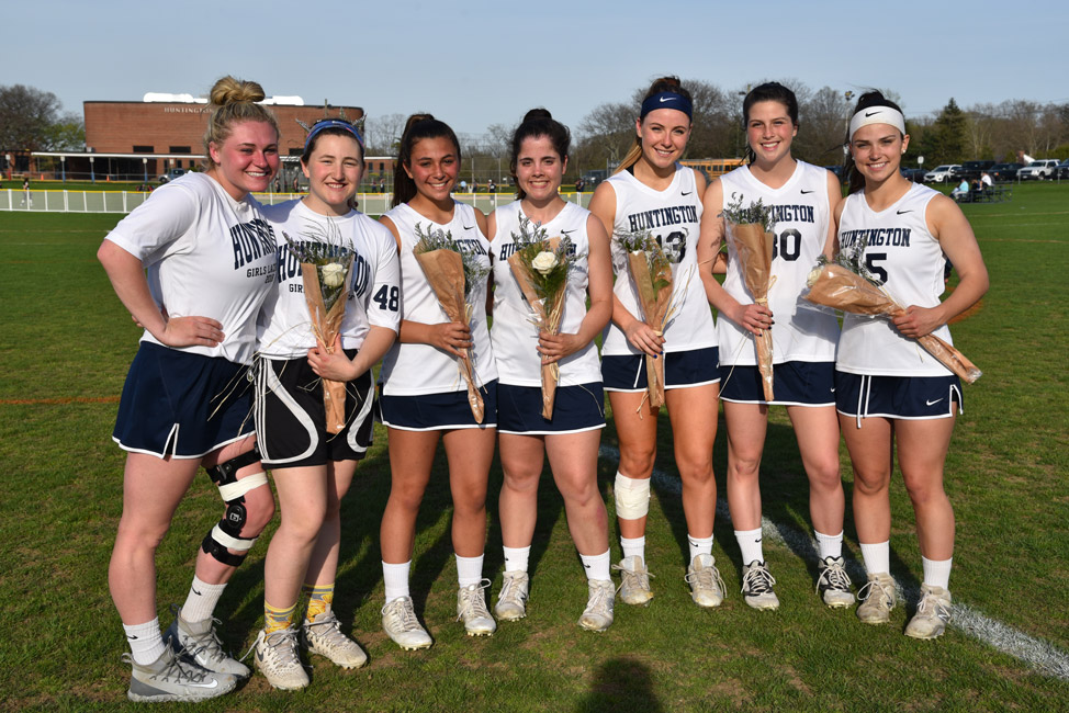 Huntington girls' lacrosse honored seven great players on Senior Day at Blue Devil Field.