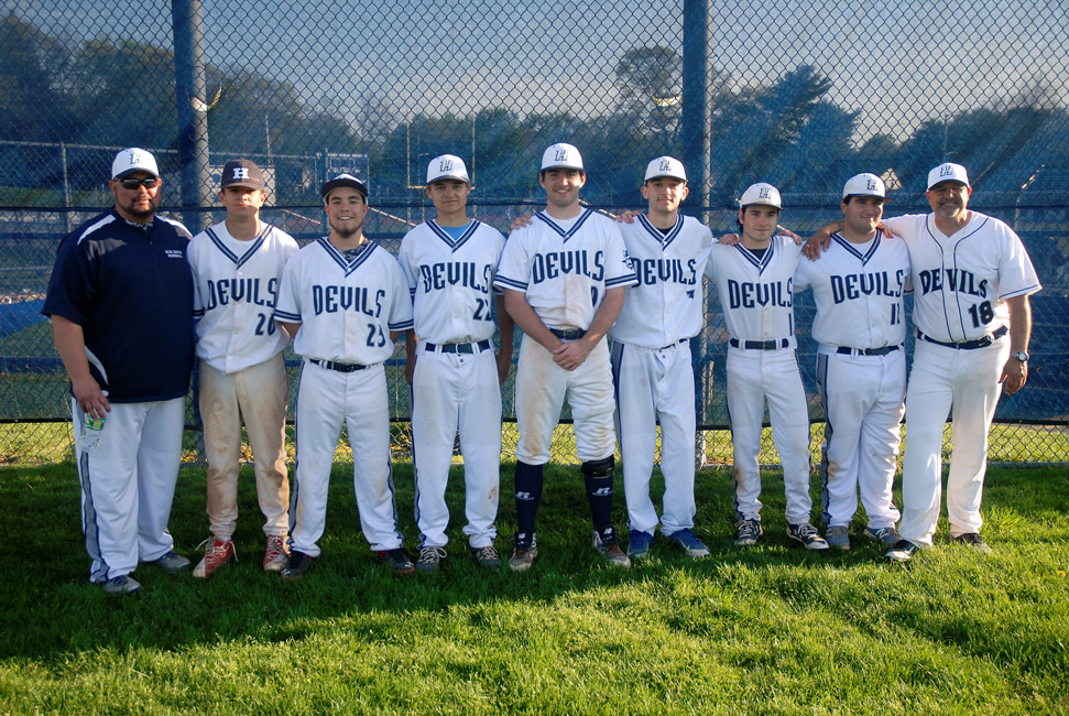 The Blue Devil baseball seniors flanked by coaches Billy Harris and Paul Caleca. (Monica Fredericks photo.)