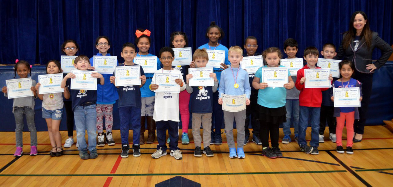 Jefferson Principal Valerie Capitulo-Saide with April's Citizens of the Month.