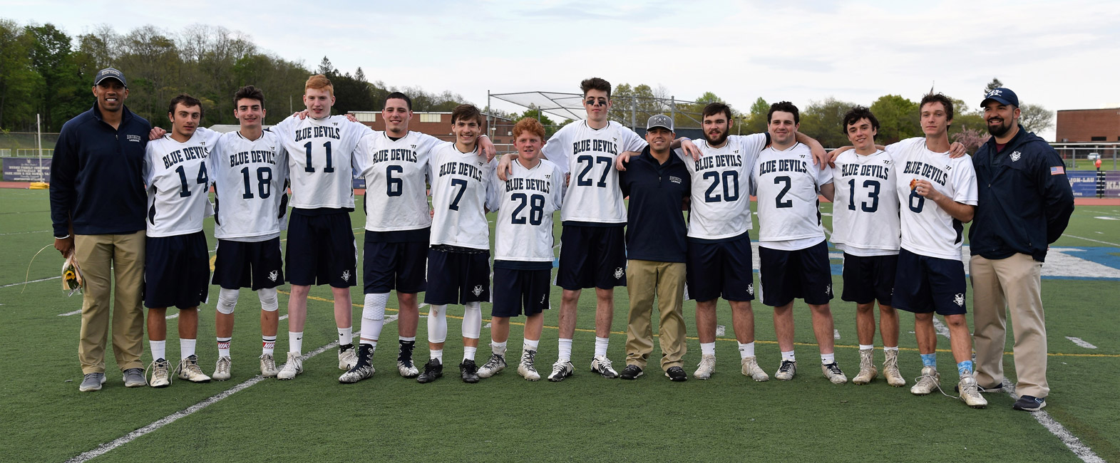 Huntington boys' lax seniors with the Blue Devil coaching staff