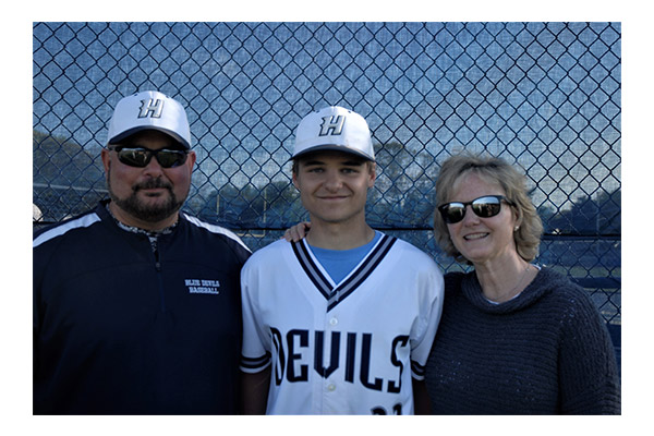 Will Vollack with his mom, Sue and head coach Billy Harris on Senior Day. (Monica Fredericks photo.)