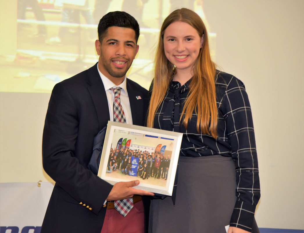 Faculty advisor Omar Santiago with senior Lindsay Saginaw.