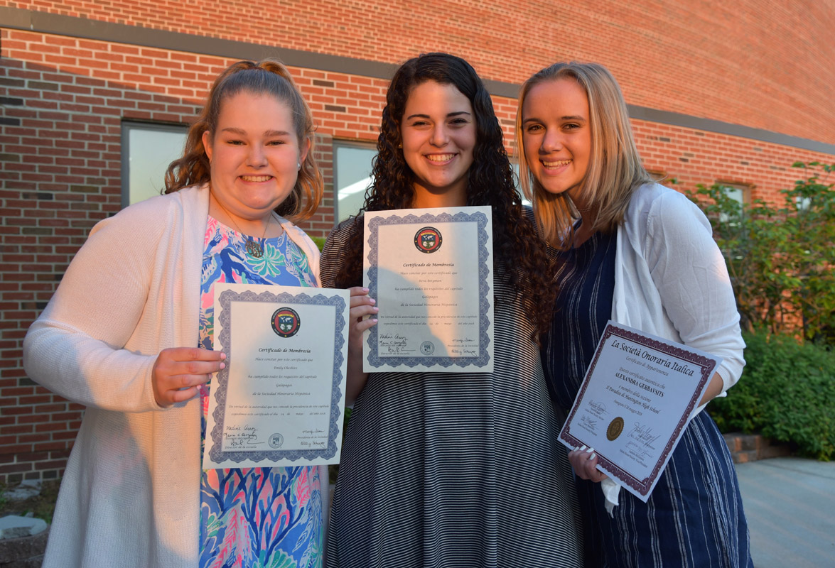 Emily Cheshire, Riva Bergman and Alexandra Gerbavsits following the induction ceremony..