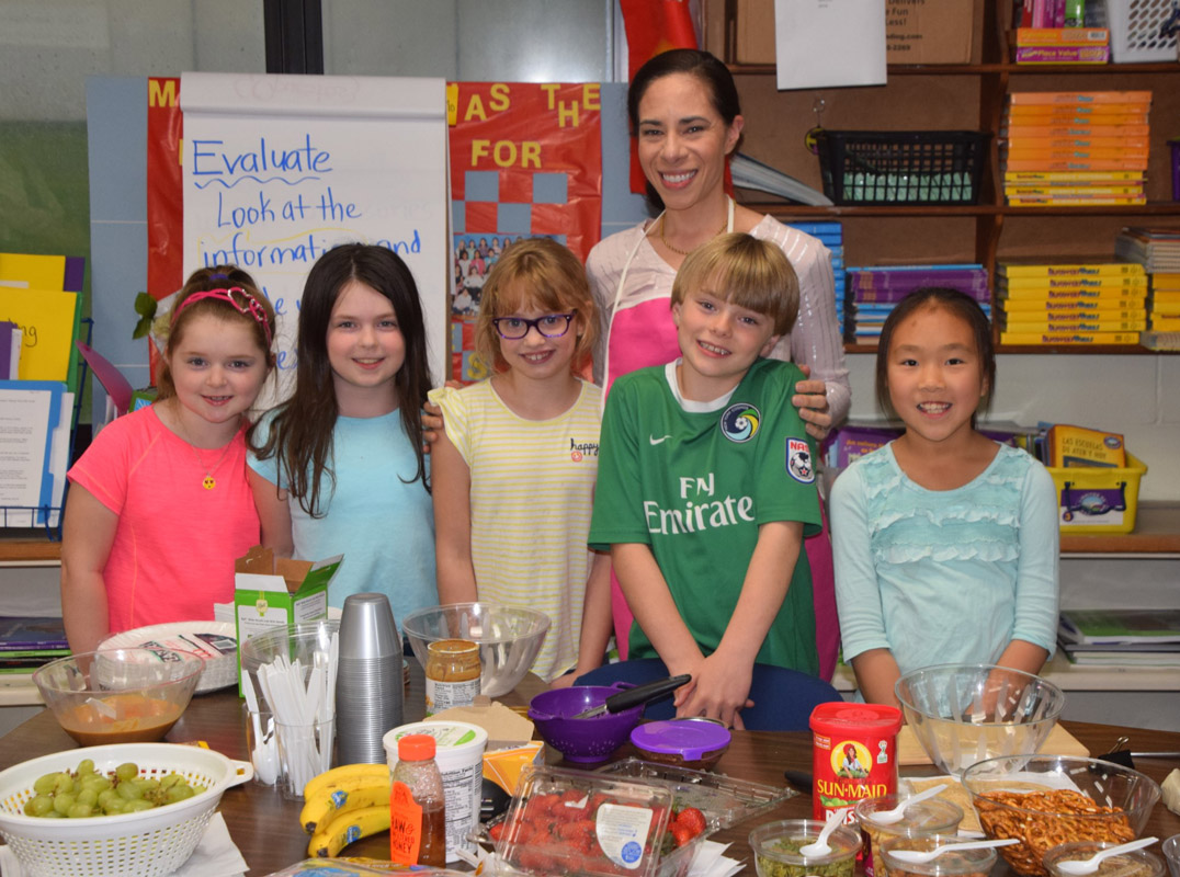 Teacher Wendy Bonilla with some of the workshop participants.