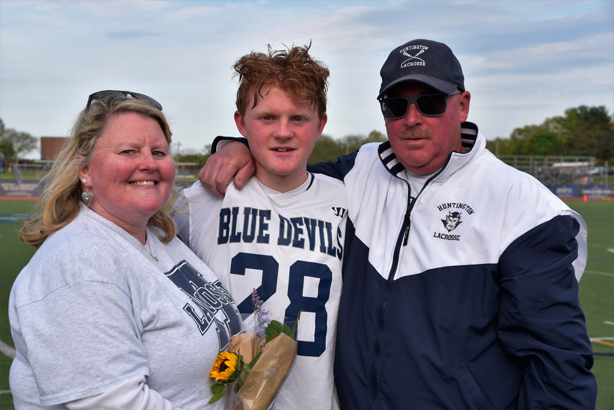 Colby Martin with his parents, Sue and Bill on Senior Day at Blue Devil Stadium.