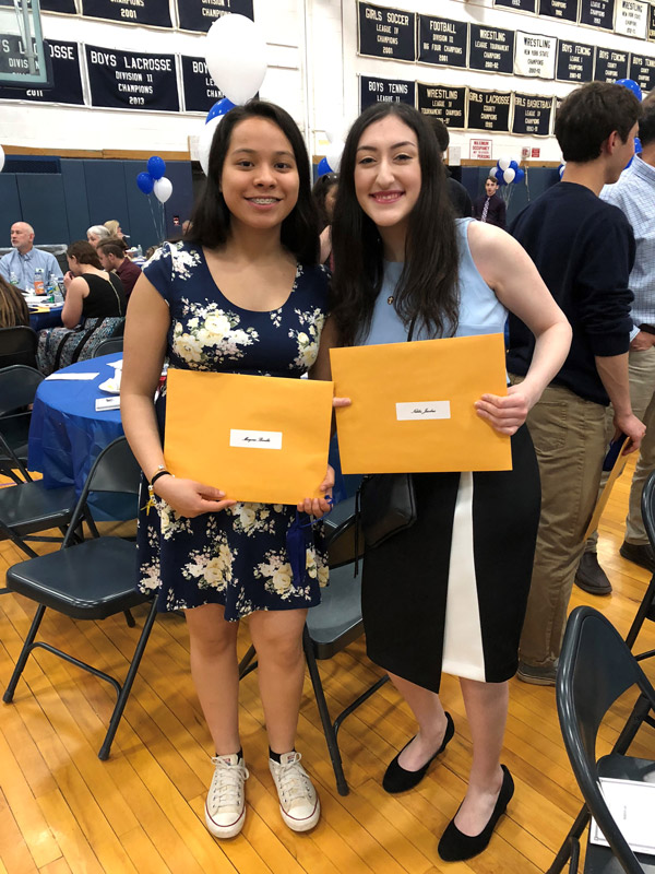 Nikki Jacobus (right) with fellow Distinguished Senior Marjorie Bonilla.