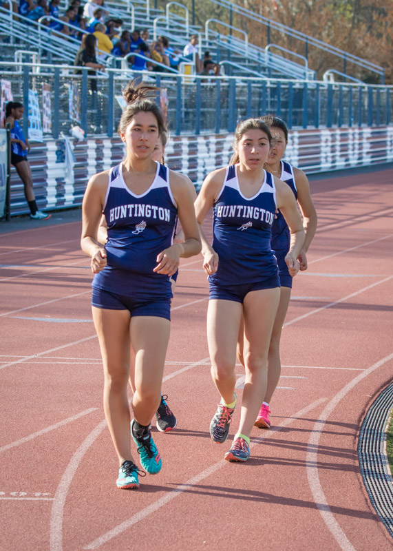 Senior Nicole Arenth leads the race-walk field. (Mike Connell photo.