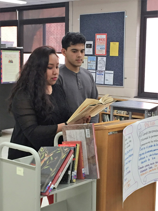 Teacher Itzel Cedilla-Rosas with one of the students that participated in the bilingual poetry reading.