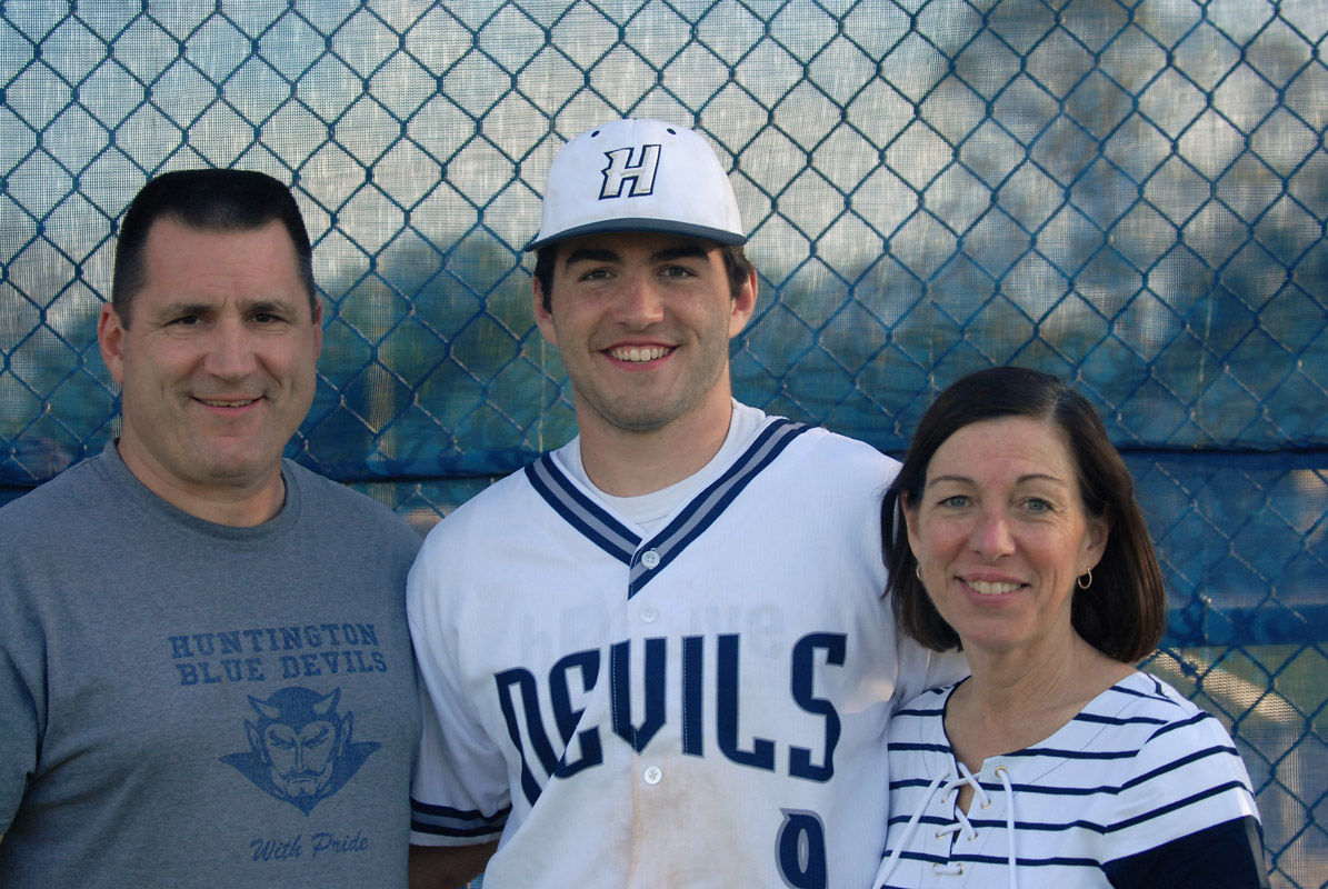 Luke Eidle on Huntington baseball Senior Day with his parents, Paul and Jean.