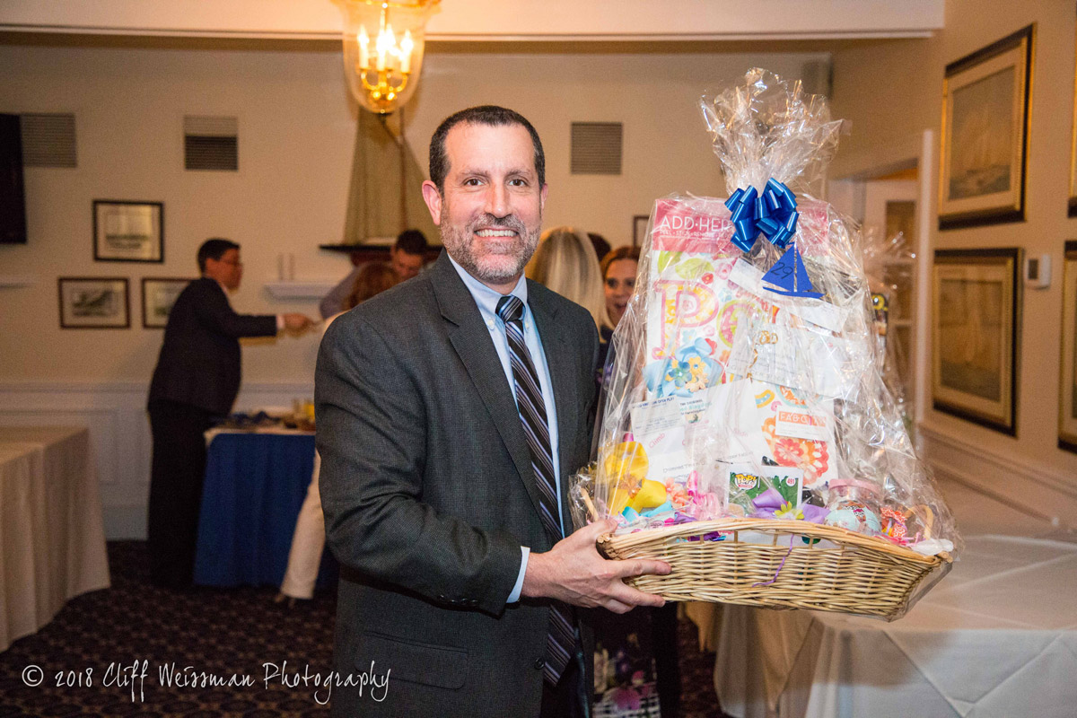 Superintendent Jim Polansky won a raffle prize. (Cliff Weissman photo.)